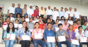 Minister for Forests & Environment Lal Singh and winners of 7th J&K State Shooting Championship posing for group photograph.