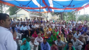 MLA R S Pathania, addressing public at Ramnagar.