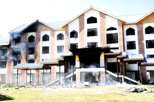 Mini Secretariat set ablaze by mob at Shopian on Sunday. -Excelsior/Younis Khaliq