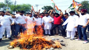 PYC activists staging protest against BJP Govt in Jammu on Sunday.