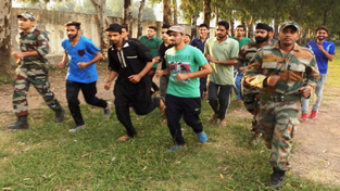 Youth running during a recruitment training conducted by Army at Surankote in Poonch district.