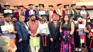 Awardees posing for photograph with chief guest and guests of honour.