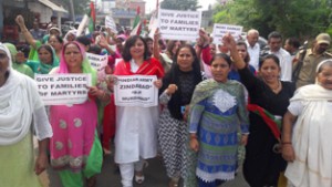 NPP women activists taking out protest rally in Jammu on Wednesday.