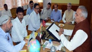 PHE Minister, Sham Lal Choudhary chairing a meeting on Friday.