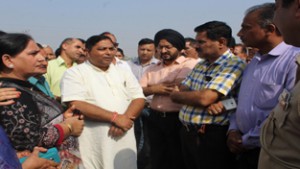 MLA Jammu West Sat Sharma along with DC Jammu, Simrandeep Singh during visit to site of stadium at Bhagwati Nagar on Friday.