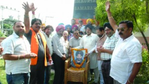 JKFFA members paying tributes to Shaheed Hav Saroop Singh at Dogra Shaurya Stamb, Ambphalla.