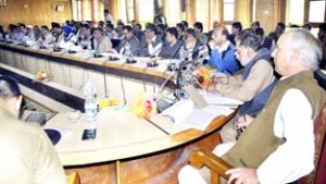 Minister for R&B Abdul Rehman Veeri chairing a meeting at Pulwama on Saturday.