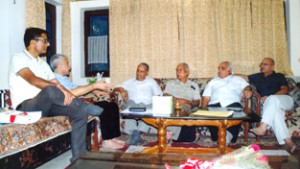 Members of AIKS Trust during a meeting at Jammu on Saturday.
