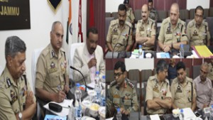 DGP K Rajindera Kumar chairing a meeting at Jammu on Friday.