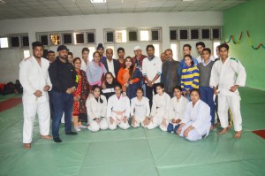 Judokas posing alongwith the dignitaries during inaugural ceremony of State Level Inter-Division Judo Championship in Jammu.