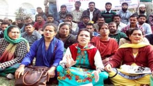 Members of Home Guards Association talking to media persons at Jammu on Thursday.