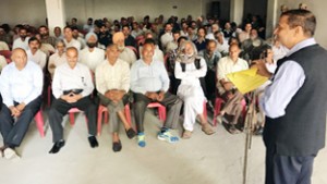 Senior Cong leader Sham Lal Sharma addressing PCC meeting at Akhnoor.
