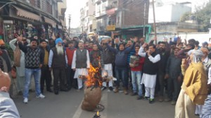 Activists of J&K National Panthers Party holding protest demonstration at Slathia Chowk, Udhampur.