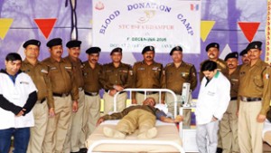 BSF men donating blood on Raising Day at Udhampur on Thursday.