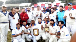 Jubliant Media XI players posing for a group photograph after registering victory.
