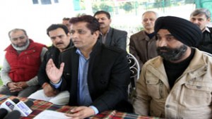 ITI employees leader Nazir Ahmed Molvi addressing press conference in Jammu on Saturday.      —Excelsior/Rakesh