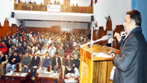 Minister of Food, Civil Supplies and Consumer Affairs Choudhary Zulfkar Ali addressing a function in Srinagar on Sunday.