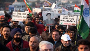 Alumni of Sainik School Nagrota and citizens from all walks of life taking out a solidarity march in honour of martyrs at Jammu. -Excelsior/Rakesh