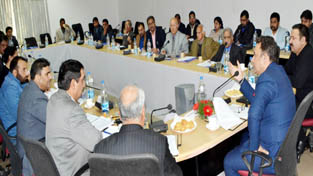 Minister for Food, Civil Supplies and Consumer Affairs Choudhary Zulfkar Ali chairing a meeting at Jammu on Monday.