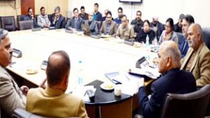 Secretary Union Human Resource Development Ministry K K Sharma reviewing higher education projects in a meeting at Jammu on Tuesday.