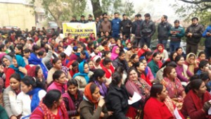 A large gathering of NHM employees during a protest near Press Club, Jammu.