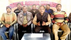 NMC president, Subhash Shastri along with others addressing media persons at Jammu on Tuesday.