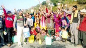 Villagers protesting against irregular supply of drinking water on Tuesday.