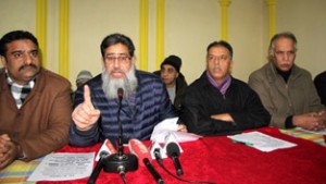 KCCI President and others addressing press conference at Srinagar on Tuesday. -Excelsior/ Shakeel