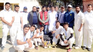 Winners posing for a group photograph after registering victory in Friendship Cup T20 match in Jammu.  