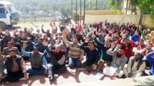 Medical employes raising slogans in support of their demands during a protest dharna at Rajouri.