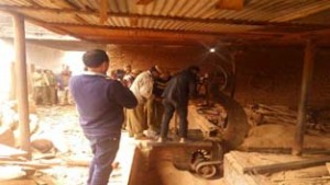Forest team dismantling illegal saw mill in Jindrah on Friday.