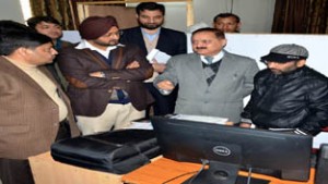 Divisional Commissioner Dr Pawan Kotwal and Deputy Commissioner Simrandeep Singh during visit to office of RD Survey and Land Records on Saturday.