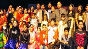 Minister for Forest Choudhary Lal Singh with participants of talent hunt show at Jammu on Saturday.