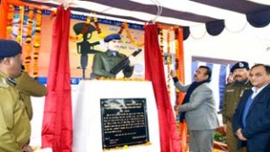 Minister for Industries and Commerce Chander Parkash Ganga unveiling the bust of CRPF Constable Naresh Kumar on Friday.
