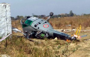 Indian Air Force Chetak helicoter toppled while attempting to land in Kathula village, both the pilots reported to be safe near Allahabad on Wednesday. (UNI)