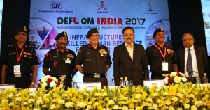 MoS Defence Subhash Bhamre and Army chief Gen Bipin Rawat at DEFCOM INDIA on Thursday.
