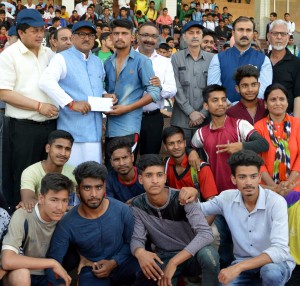 Players posing along with DyCM Dr Nirmal Singh and other dignitaries on concluding ceremony of Khelo India Games in Jammu.