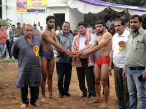 MLA Jammu East Rajesh Gupta felicitating wrestlers in Jammu on Thursday.