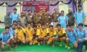 Players posing alongwith SSP Jammu, Dr Sunil Gupta and other dignitaries during inaugural ceremony of Volleyball Tournament.
