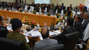 Minister for PHE Sham Lal Choudhary chairing a meeting of DDB Kathua on Monday. 