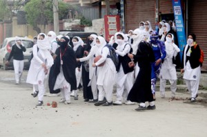 Female students protesting in Srinagar on Monday.  -Excelsior/Shakeel