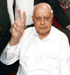National Conference president Dr Farooq Abdullah showing victory sign after winning by-election from Srinagar Lok Sabha constituency on Saturday.              -Excelsior/ Shakeel