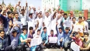 JKNPP activists led by Harsh Dev Singh holding protest outside PSC at Jammu.