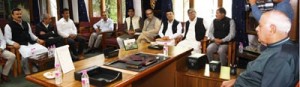 NC president Farooq Abdullah addressing a meeting of the party legislators in Srinagar on Thursday.