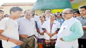 DyCM Dr Nirmal Singh interacting with people in Kathua on Tuesday.