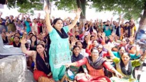 Female Multipurpose Health Workers staging protest dharna at Madam Shashi Bala Memorial Park in Jammu.