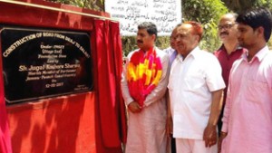 MP Jugal Kishore Sharma laying foundation stone of Draj-Salhat road on Saturday.  —Excelsior/Bhat