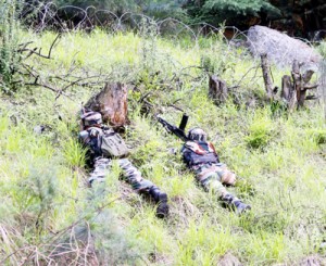 Army personnel during encounter at LoC in Uri sector on Saturday. -Excelsior/ Aabid Nabi
