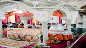 A sikh preacher reciting Gurbani in Gurdwara, Digiana  Ashram, Jammu on the occasion of Parkash Utsav of Guru Hargobind Ji. 