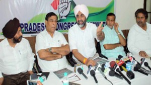 Punjab Finance Minister, Manpreet Badal addressing press conference in Jammu on Friday. -Excelsior/Rakesh